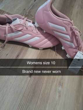 adidas Women’s Pink Soccer Cleats with White Stripes